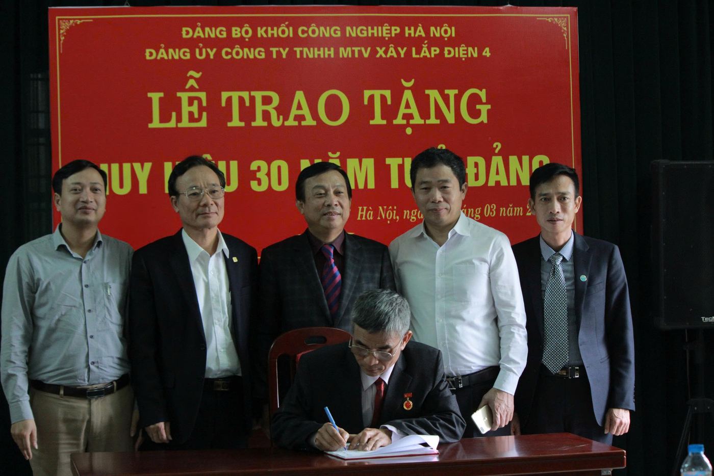 Ceremony awarding the 30-year Party membership badge
